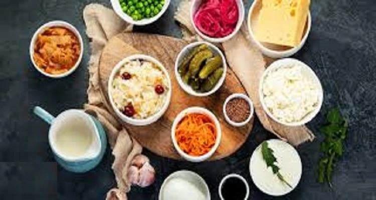 Your Natural Health - An image of various probiotic foods, including yogurt, kefir, sauerkraut, and kimchi